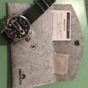 Men’s watch. Brand new with case manual and cleaning cloth. Never worn. EST set